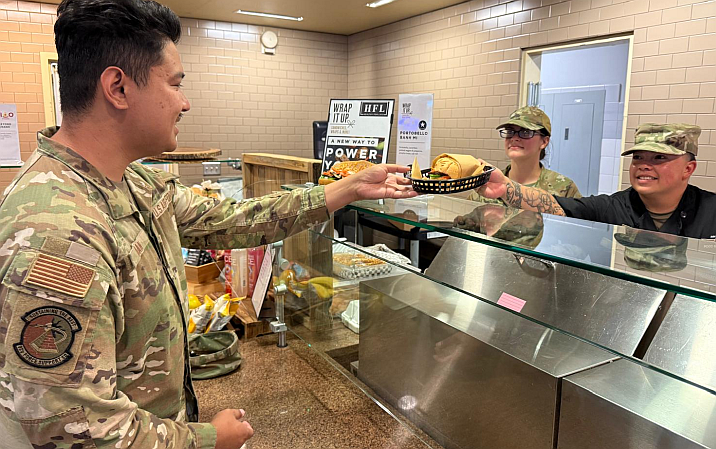 airman being served at cafe